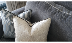 Textured charcoal and cream cushions