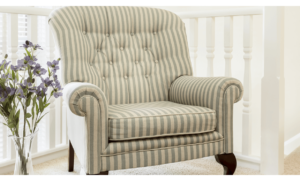 Upholstered striped armchair