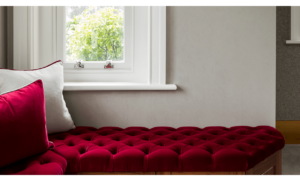 Upholstered textured red window bench