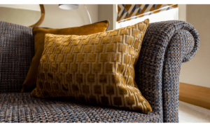 Upholstered textured sofa and cushion