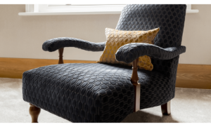Upholstered contemporary textured arm chair with cushion