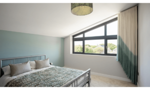 Bespoke wave curtain for half apex window