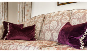 Re-upholstered knoll settee in Voyage Cotswold Clemence fabric