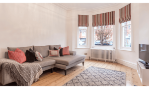 Multi coloured bespoke Roman Blinds for a Bay window