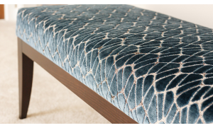 Re-covered contemporary stool in a black edition velvet weave