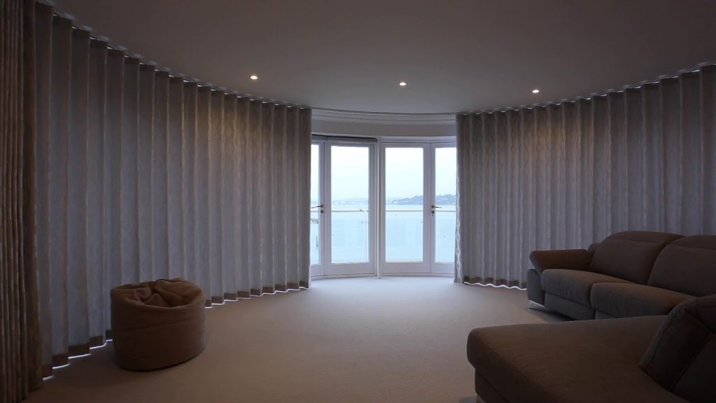 Automated curtains in Sandbanks by Bryant Interior Furnishings