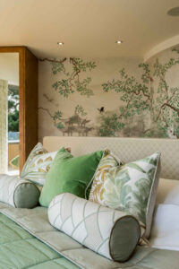 Chinese mural wallpaper and upholstered headboard
