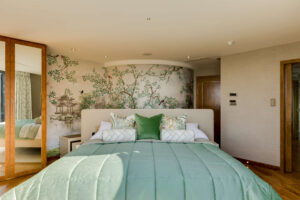 Chinese mural wallpaper and upholstered headboard