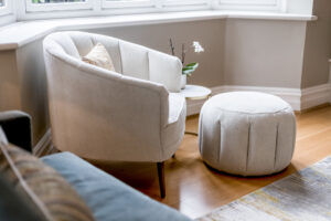 luxury cream armchair and foot stall
